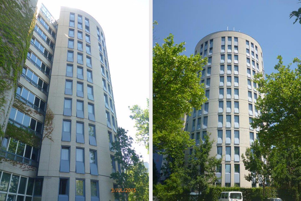 Two residential towers with trees at Sommerhaus Hotel Linz