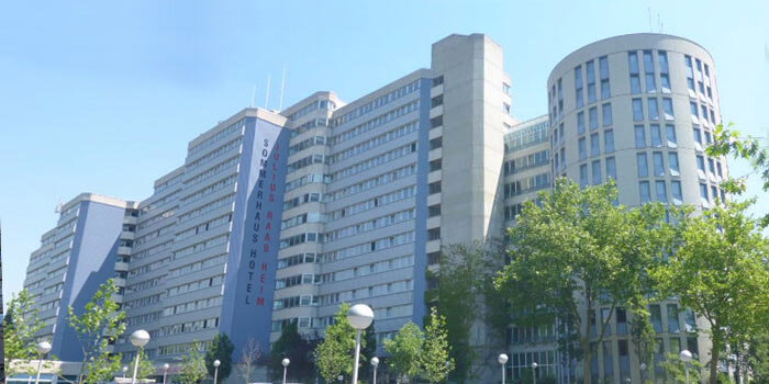 Bright high-rise facade in Linz under a blue sky